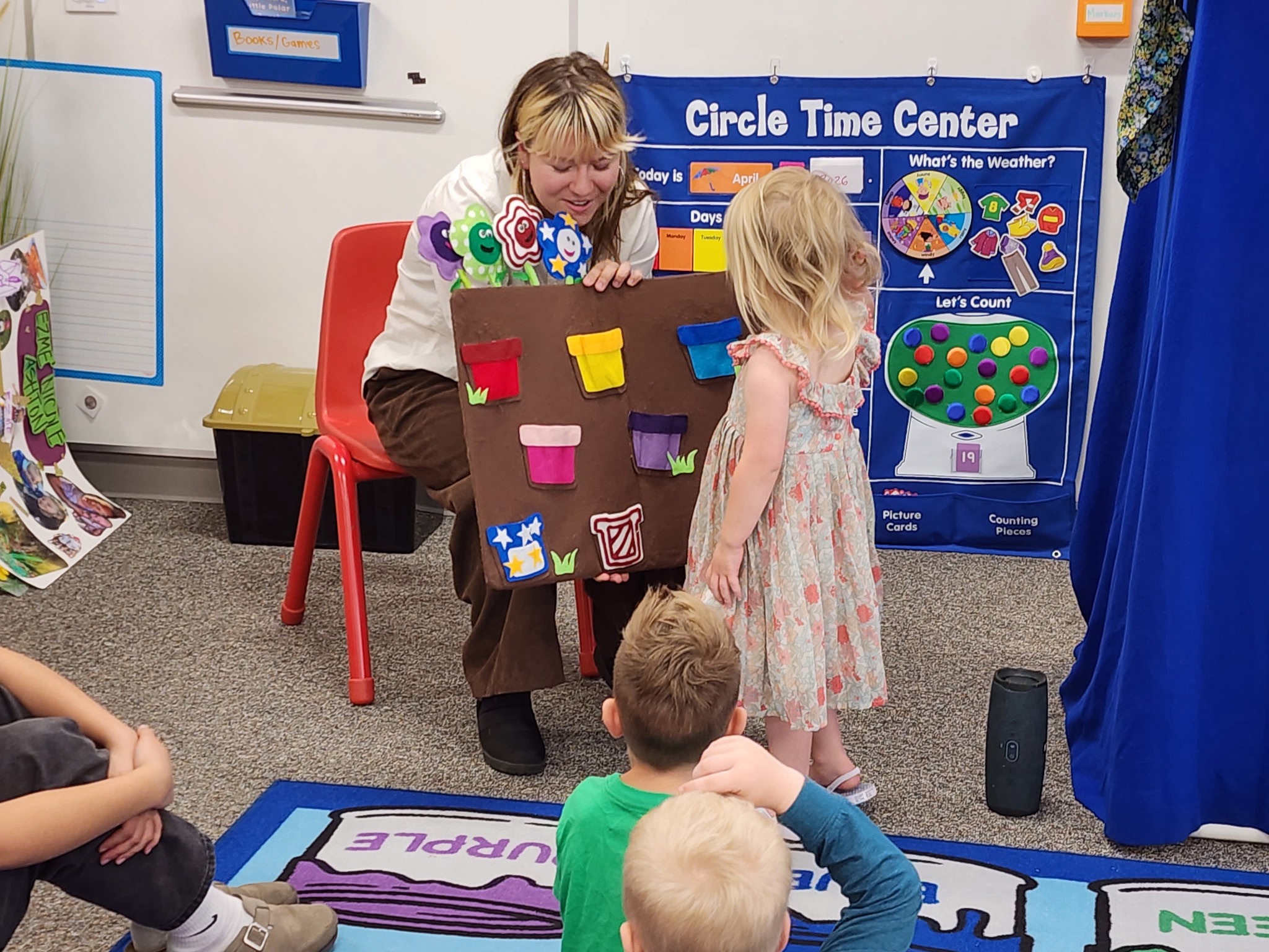Kids laughing during a Puppet Players show